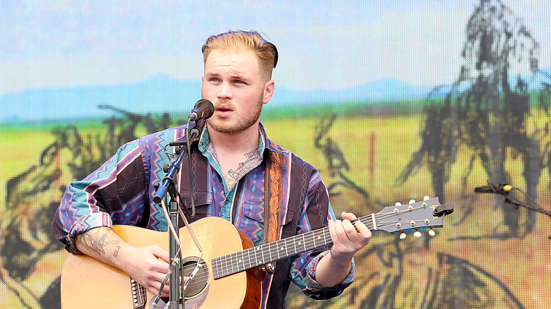 Zach Bryon playing guitar