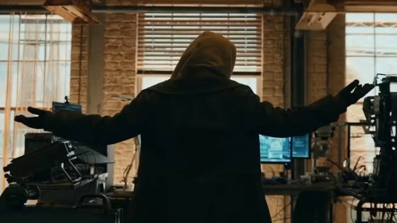 A hooded Jean Grey shrugging in Spider-Man: Brand New Day