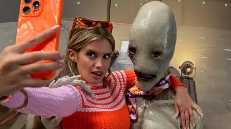 Sara Sampaio taking a selfie with Trevor Newlin as Mr. Handsome on the "Superman" set
