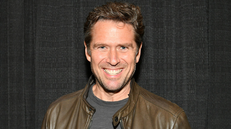 Alexis Denisof smiling