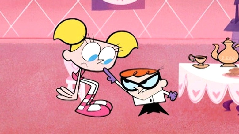 Dexter pointing angrily at Dee Dee