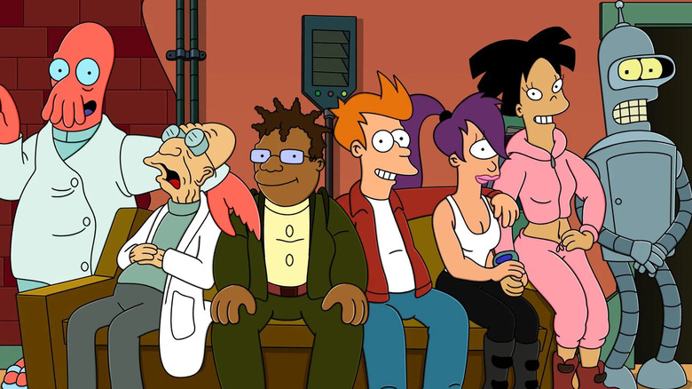 The main cast of Futurama smiling on couch