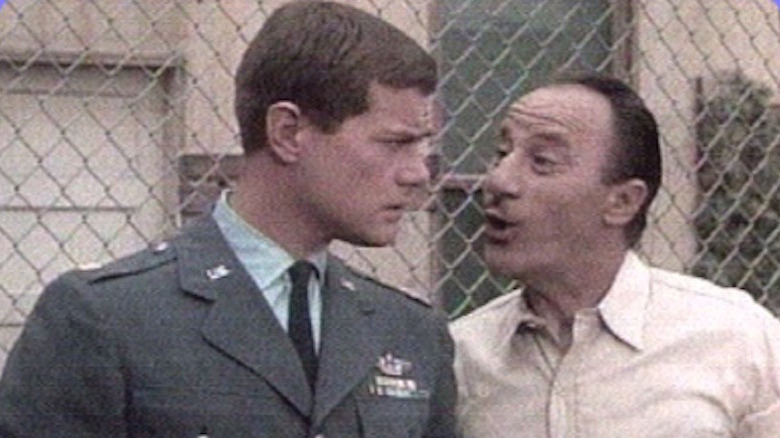 Larry Hagman and Dick Wilson (r)