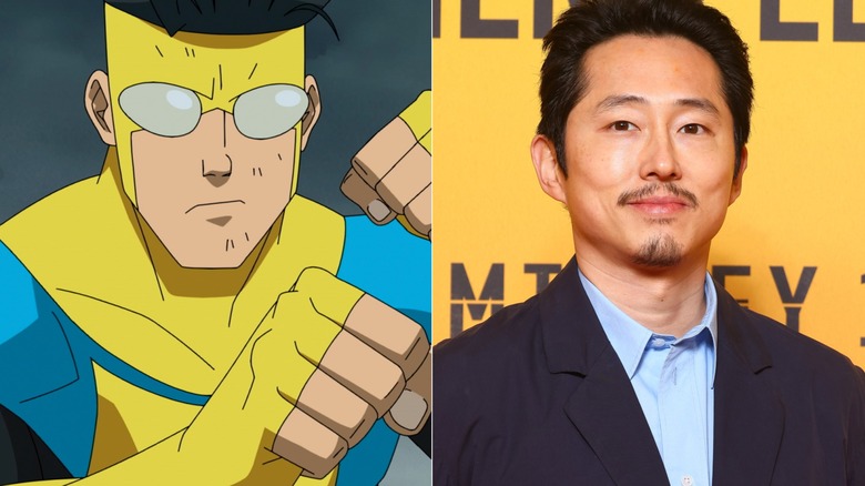 Mark Grayson with fists raised on Invincible next to Steven Yeun at Mickey 17 premiere