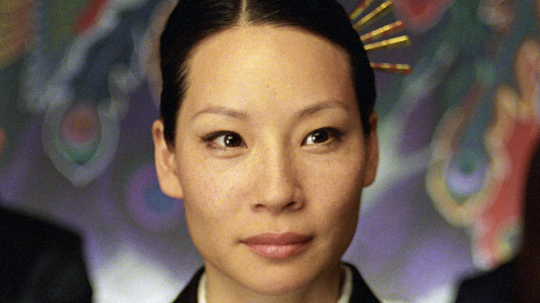 Lucy Liu smirking