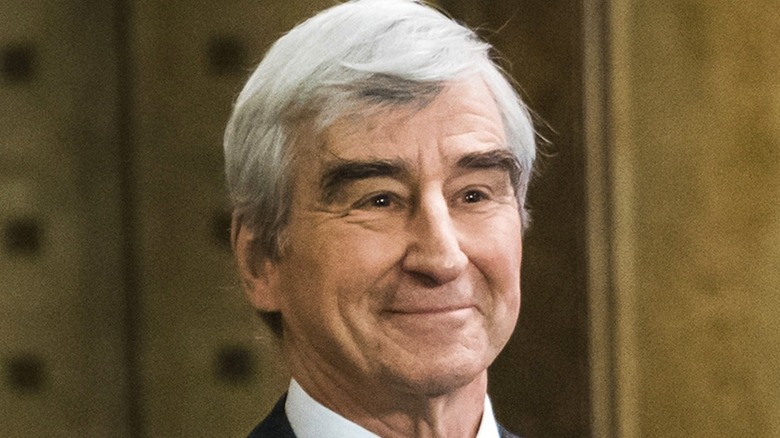 Jack McCoy smiling in courtroom