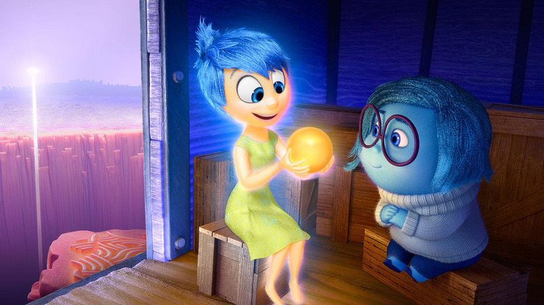 Joy showing Sadness a memory in Inside Out