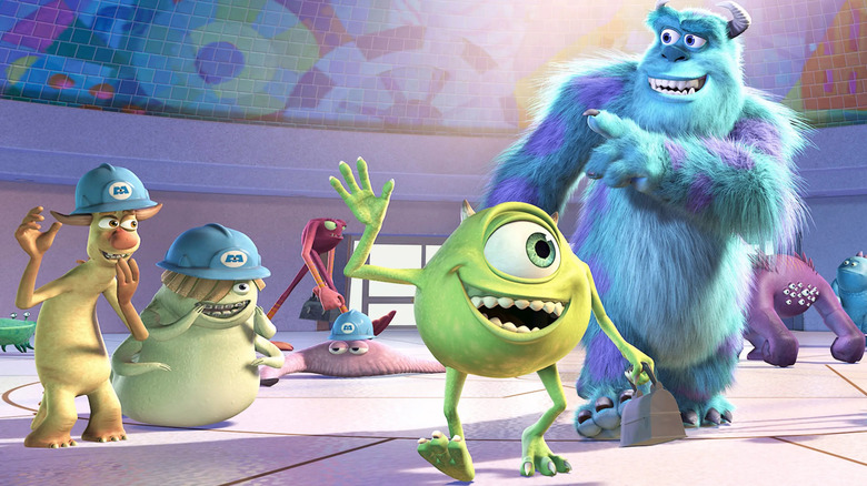 Sulley and Mike wave goodbye to coworkers with a smile in Monsters, Inc.