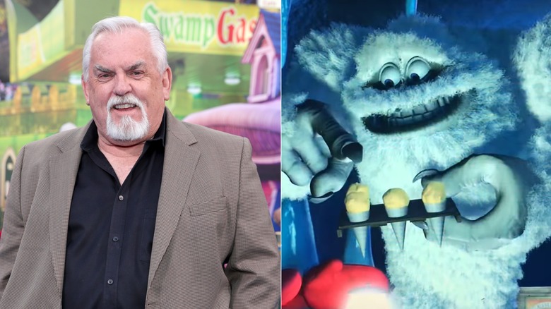 John Ratzenberger smiles on the red carpet premiere next to Yeti pointing at snow cones
