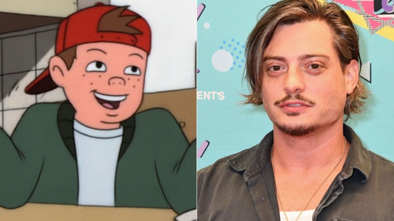 T.J. at a table on Recess next to Andrew Lawrence posing at an event