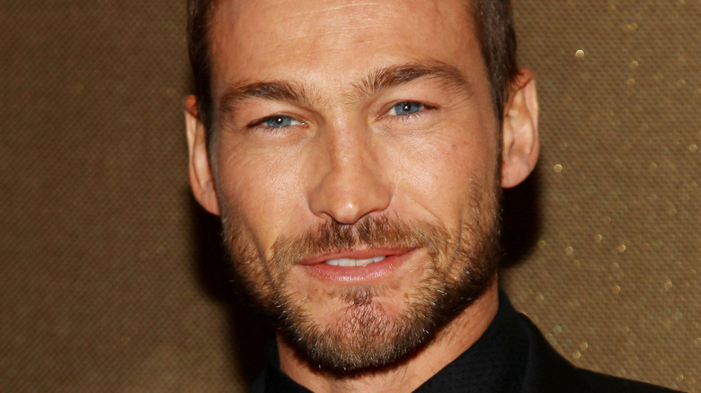 Andy Whitfield smiles