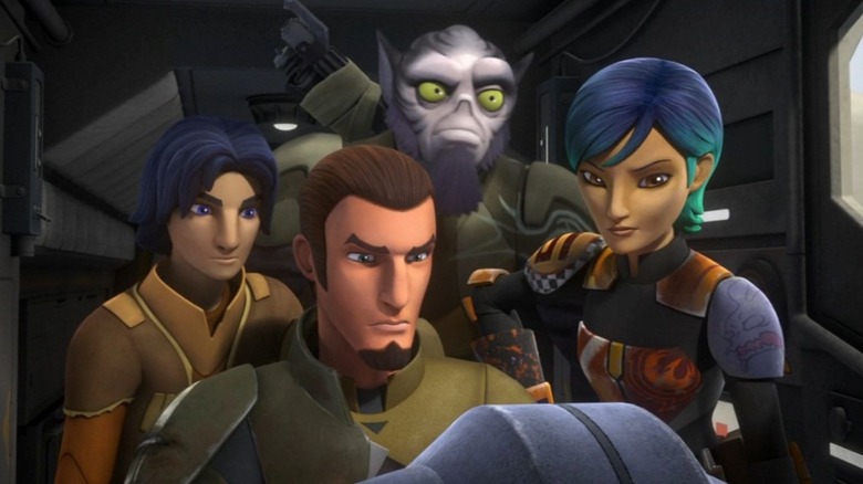 Ezra Bridger, Zeb Orrelios, and Sabine Wren stand behind Kanan Jarrus on a starship in Star Wars Rebels