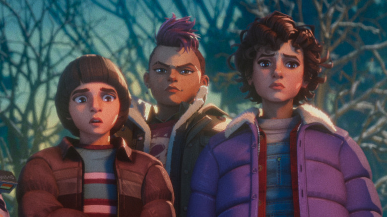 Will, Nikki, and Eleven looking alert on 