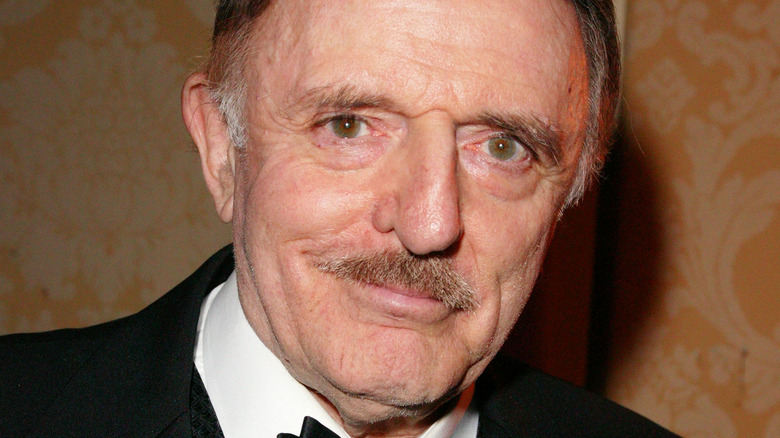 an older John Astin