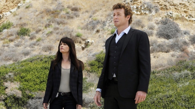 Jane and Lisbon outside investigating in The Mentalist