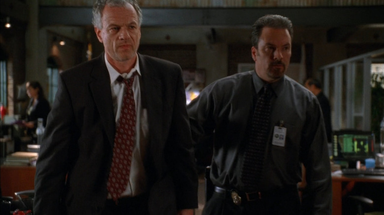 John Troy Donovan escorting suspect on The Mentalist