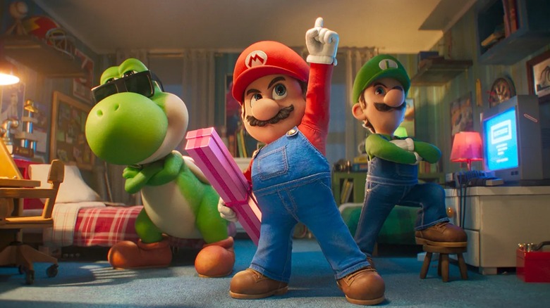 Yoshi wearing sunglasses Mario pointing up and Luigi posing in The Super Mario Movie