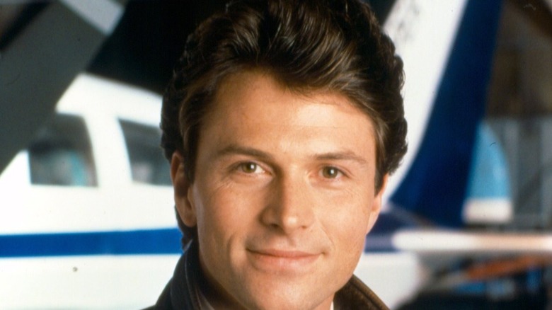 Joe Hackett in front of a plane