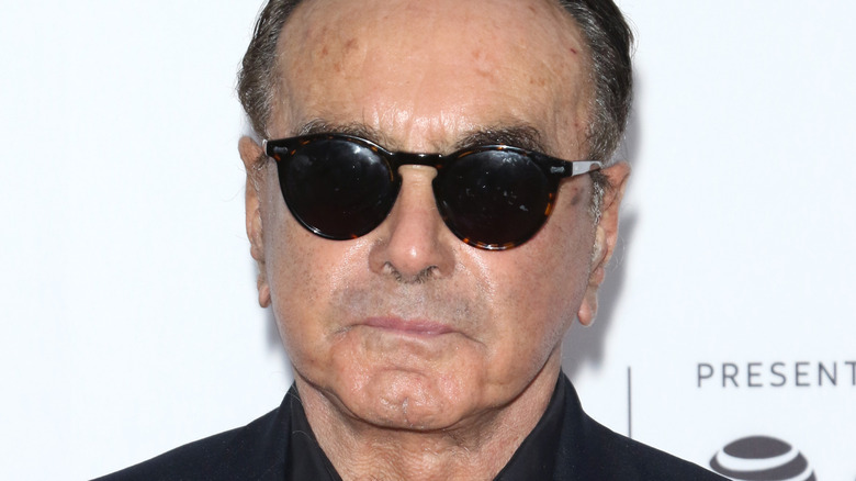 Dan Hedaya wearing sunglasses
