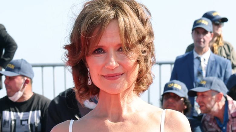 Jean Louisa Kelly wears white