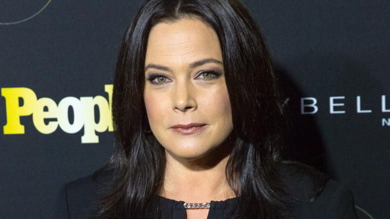 Liza Snyder wears black