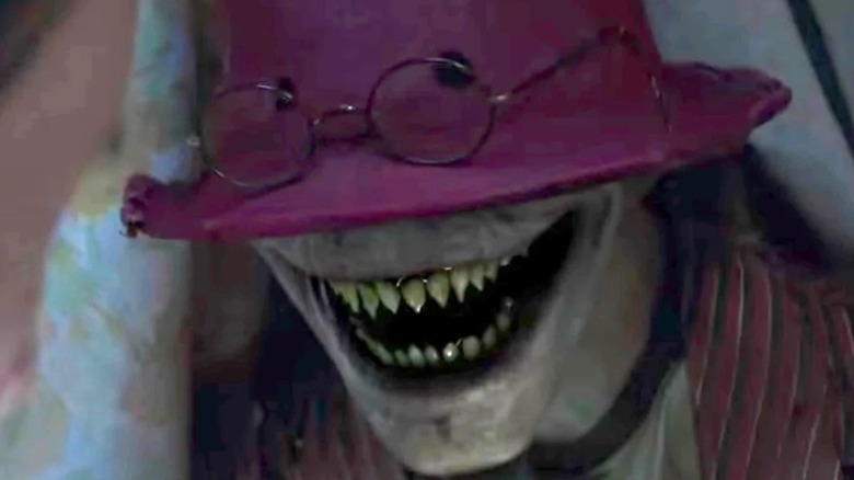 Crooked Man showing pointy teeth