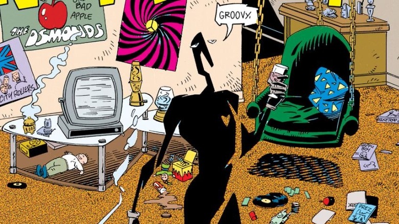 Mr. Nobody standing in messy rooom