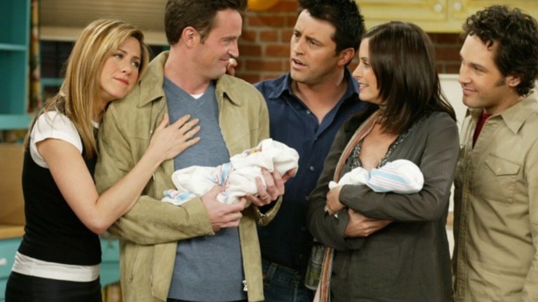 Chandler and Monica with their twins