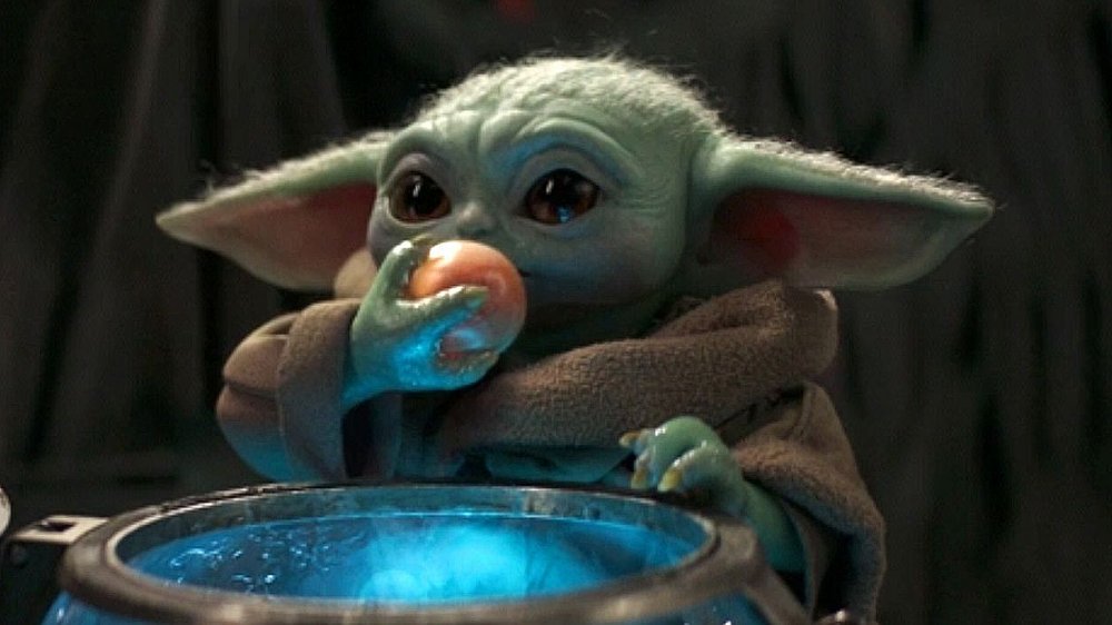 Baby Yoda eating an egg on The Mandalorian