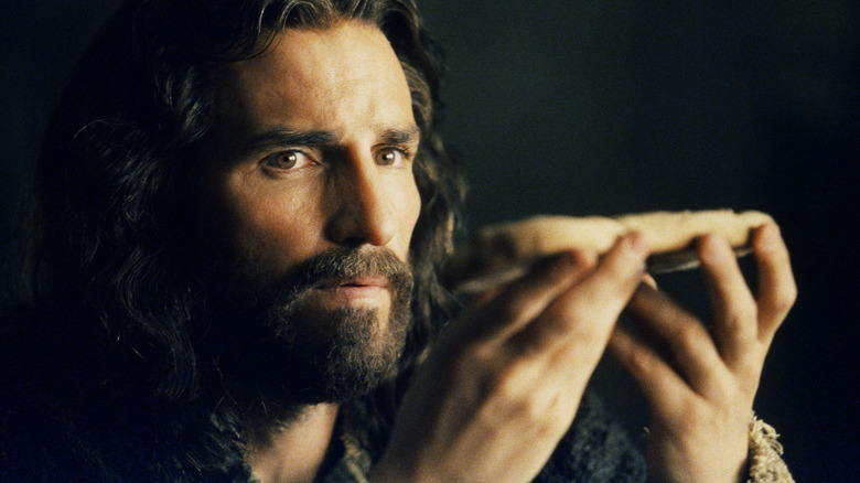 Jesus offering some bread 