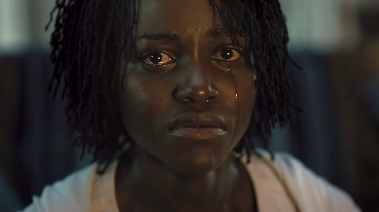 Lupita Nyong'o as Adelaide crying in Us