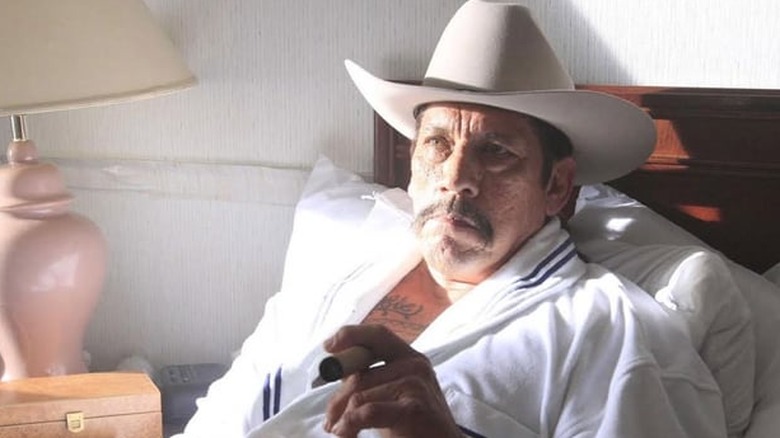 Tortuga smokes a cigar