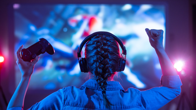 Woman playing PlayStation