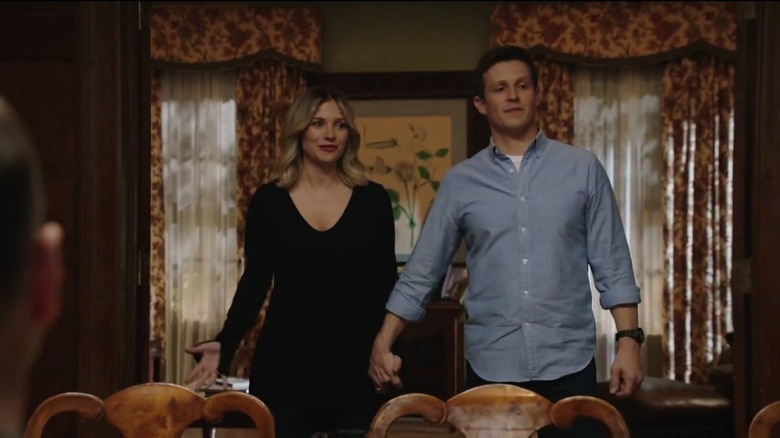 Eddie holding hands with Jamie