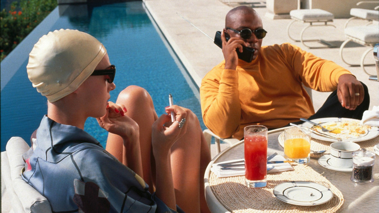 Mia and Marsellus Wallace at poolside in Pulp Fiction (1994)