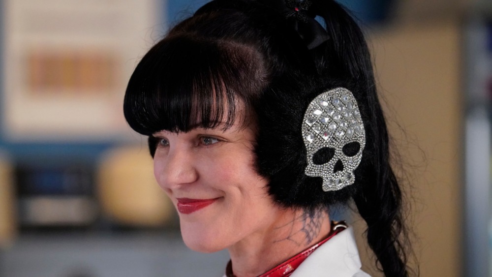 Pauley Perrette wears skull earmuffs on NCIS