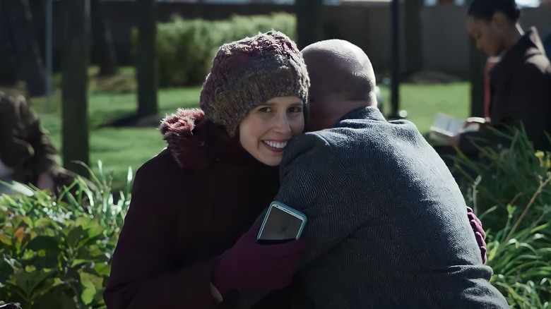 Evie hugging Colin Robinson