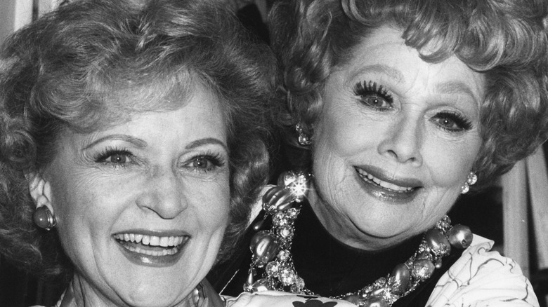 Betty White and Lucille Ball pose together