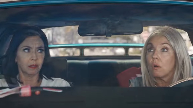 Flo and Janice gossiping in Flo's car