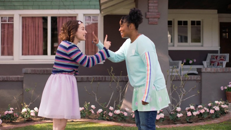 Akilah and Milana playing outside