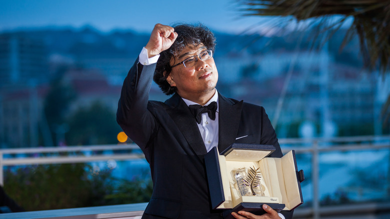 Bong Joon-Ho holding award