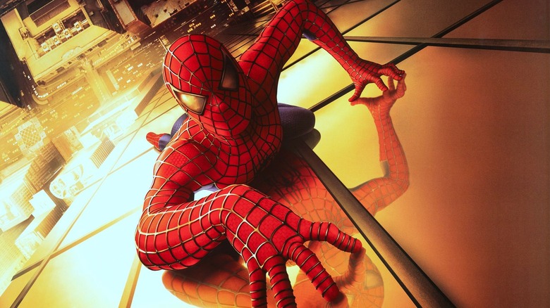 Spider-Man climbs a wall