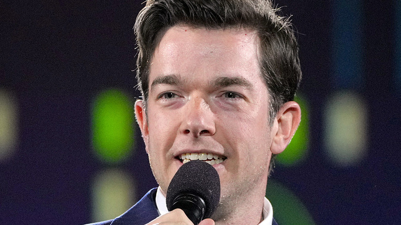 John Mulaney performing stand-up comedy