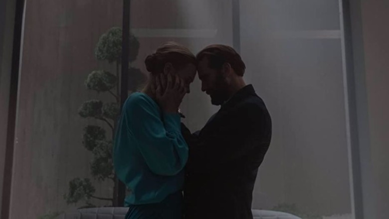 Serena Joy Fred embracing