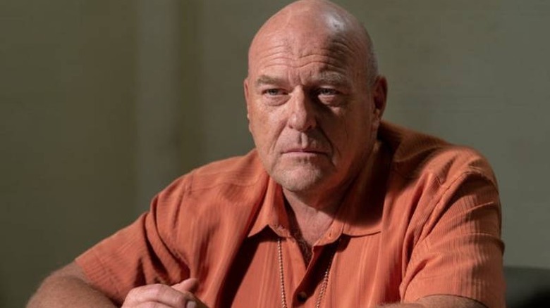 Hank often wears orange, indicating he's a threat to Walter