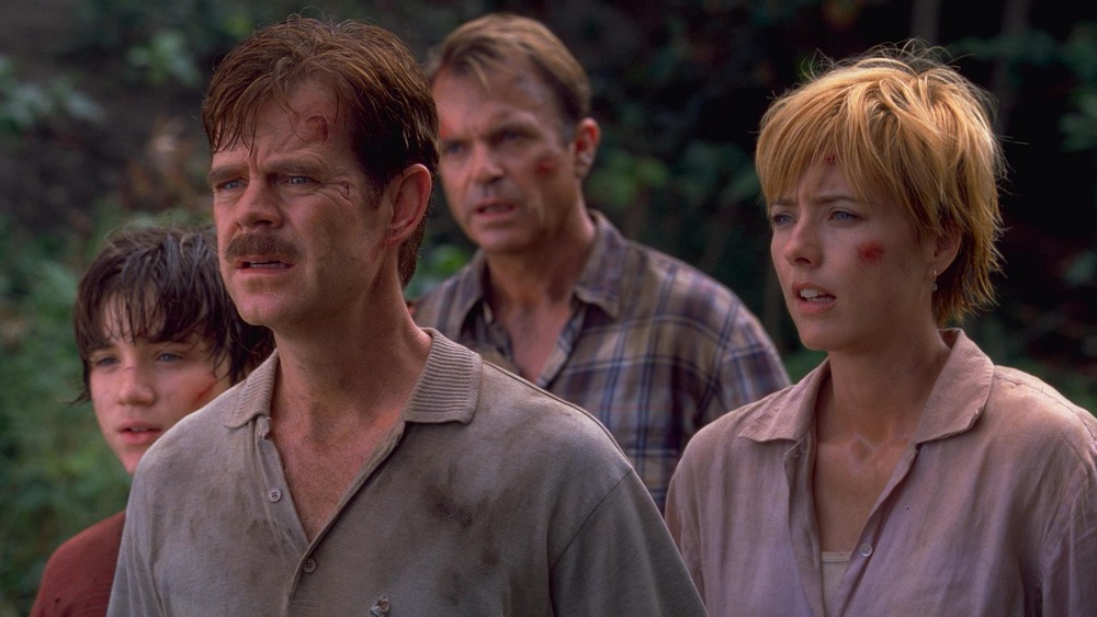 Trevor Morgan as Eric Kirby, William H. Macy as Paul Kirby, Sam Neill as Dr. Alan Grant, and Téa Leoni as Amanda Kirby in Jurassic Park III