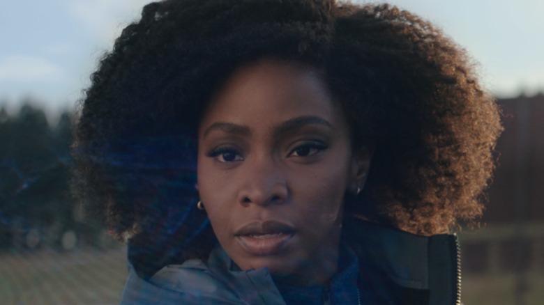 Monica Rambeau looking curiously at the Hex