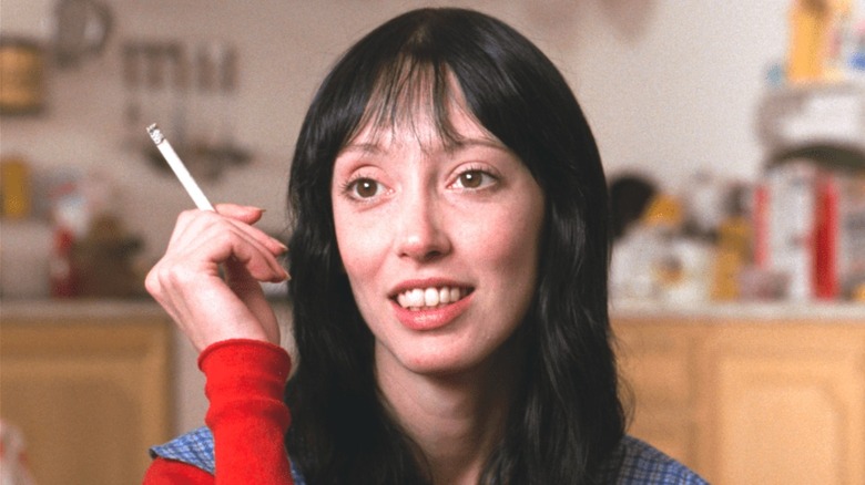 Wendy smoking in the kitchen