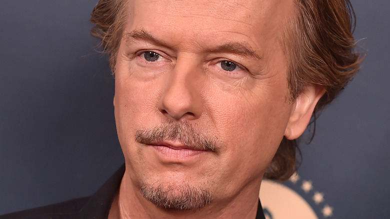 David Spade staring ahead