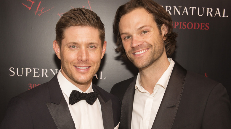 Jensen Ackles and Jared Padalecki smiling at the 